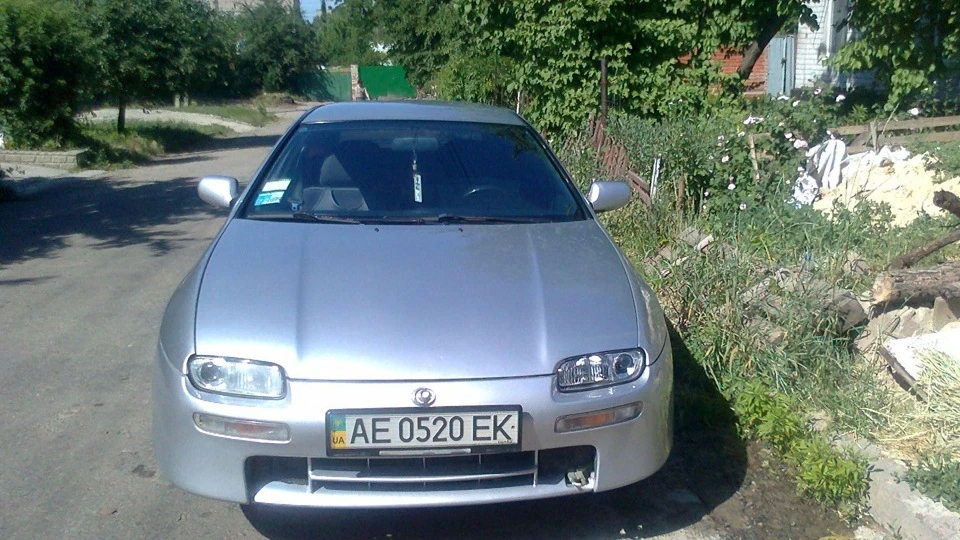 Mazda 323 1.5 сріб. метал 4