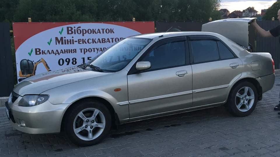 Mazda 323 1,6 i Protege 2