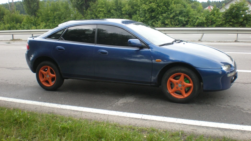 Mazda 323 1,8 bp-26 3