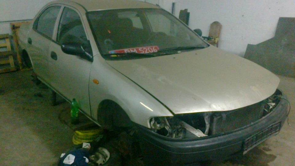 Mazda 323 Бежевая Японочка. 5