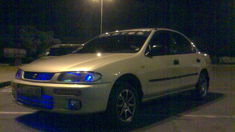 Mazda 323 Бежева ластівка . . . 3