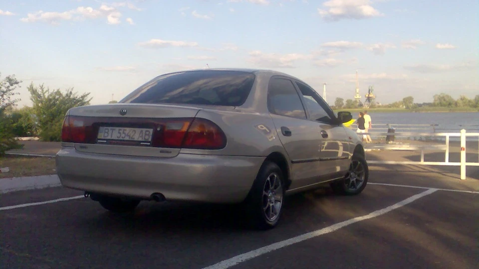 Mazda 323 Бежева ластівка . . . 4