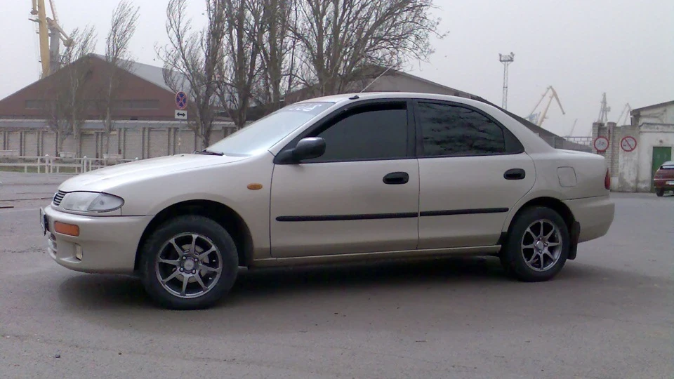 Mazda 323 Бежева ластівка . . . 5