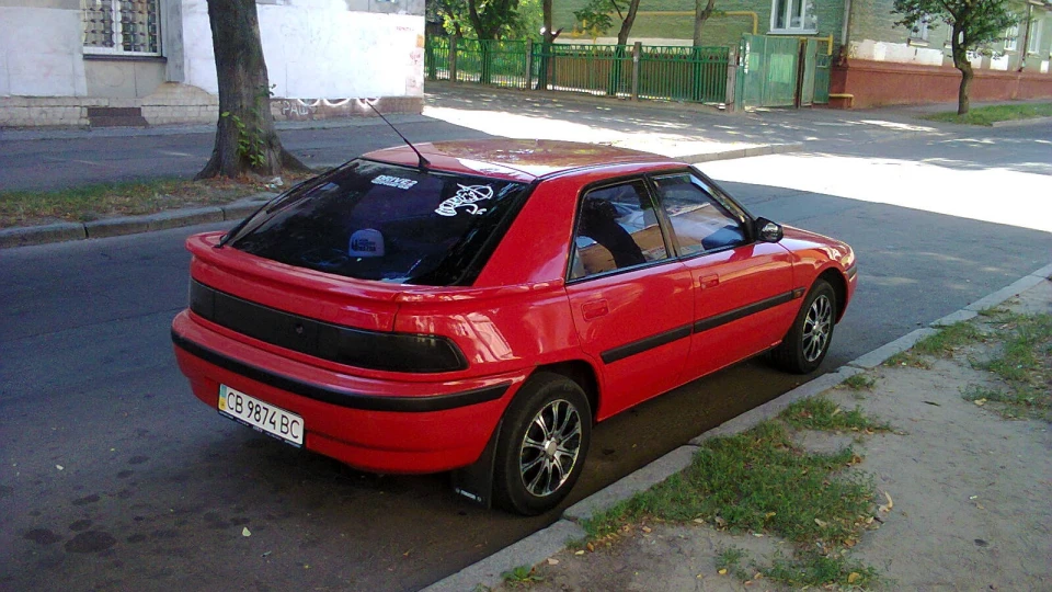 Mazda 323 f мася