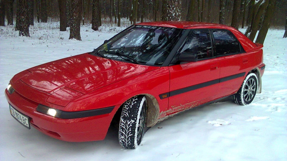 Mazda 323 f мася 3