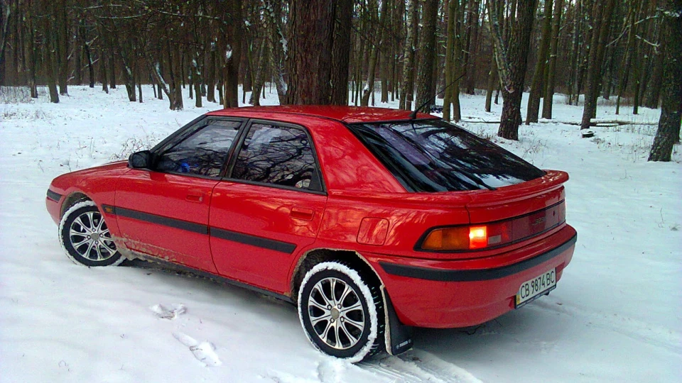 Mazda 323 f мася 4