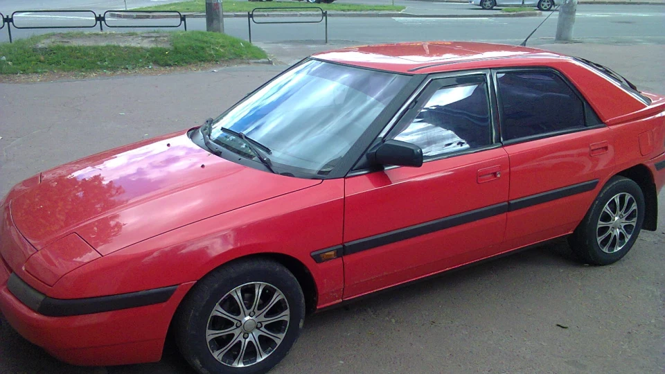 Mazda 323 f мася 5