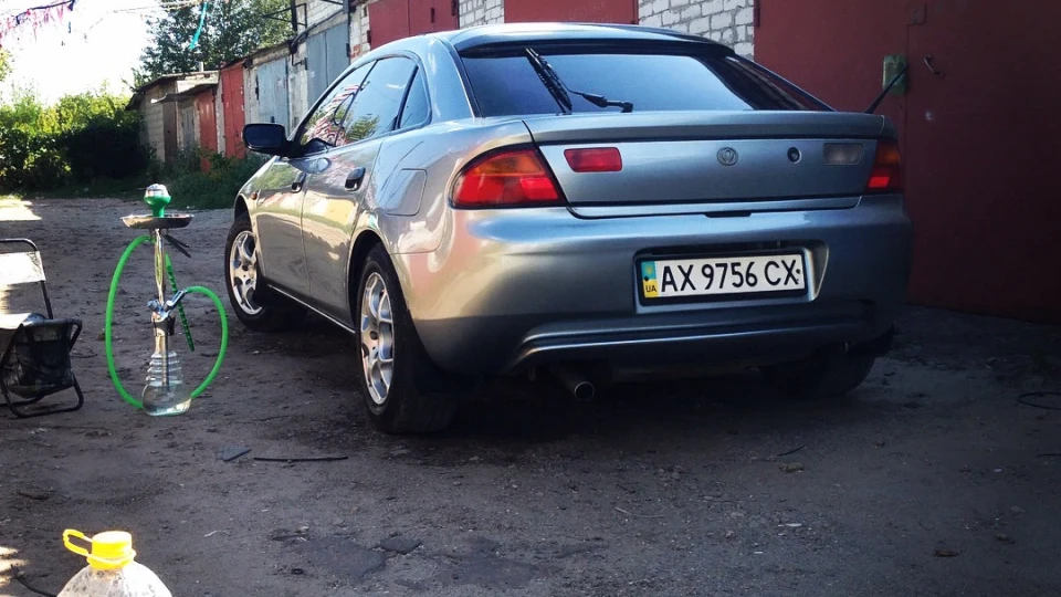 Mazda 323 f ва 2