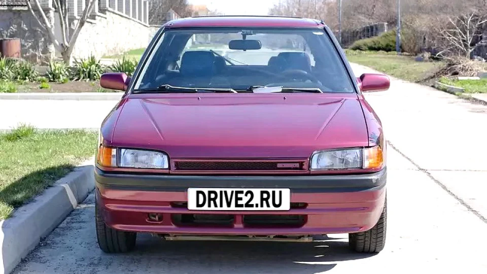 Mazda 323 Жінка 2