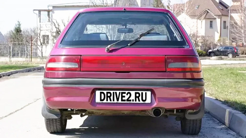 Mazda 323 Жінка 3