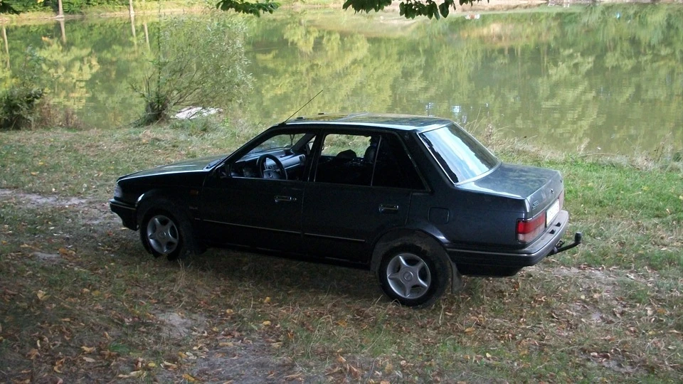 Mazda 323 Маздулетік 4