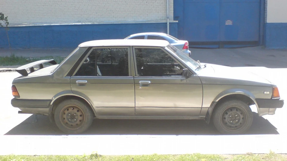 Mazda 323 мокрий асфальт металік 2