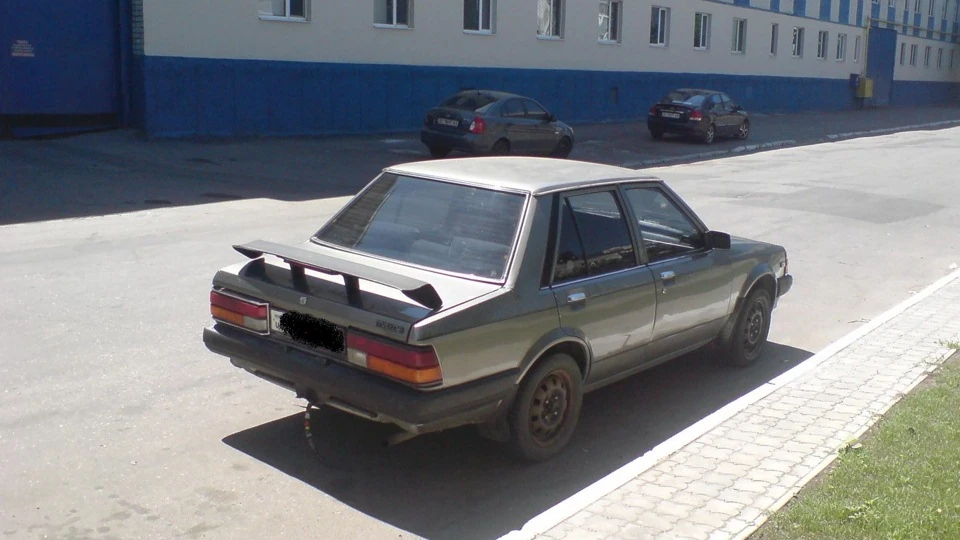 Mazda 323 мокрий асфальт металік 3