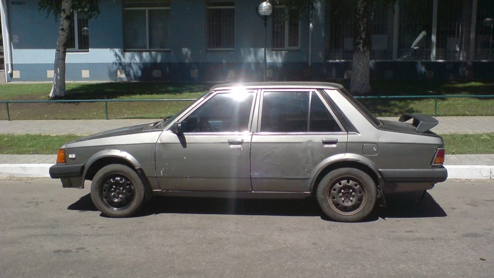 Mazda 323 мокрий асфальт металік 5
