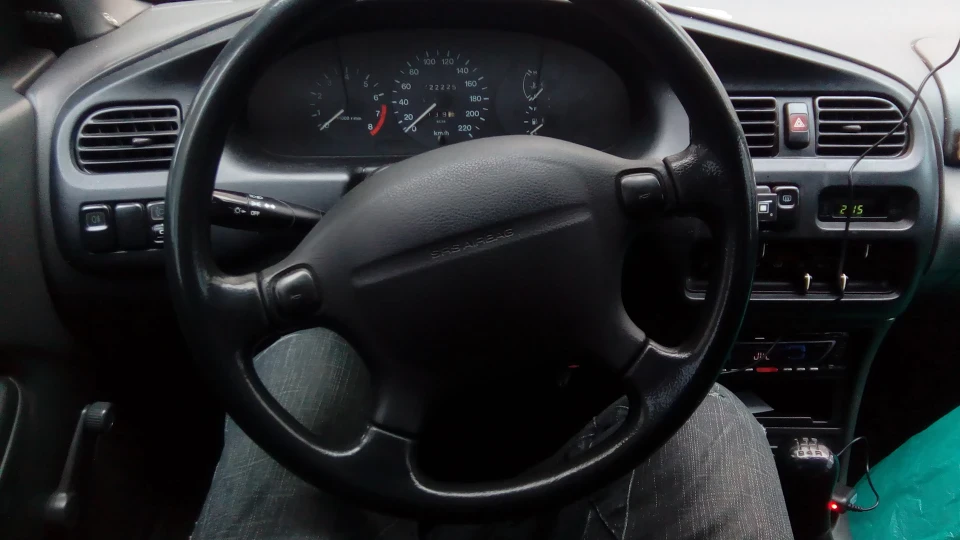 Mazda 323 На бляхах 2