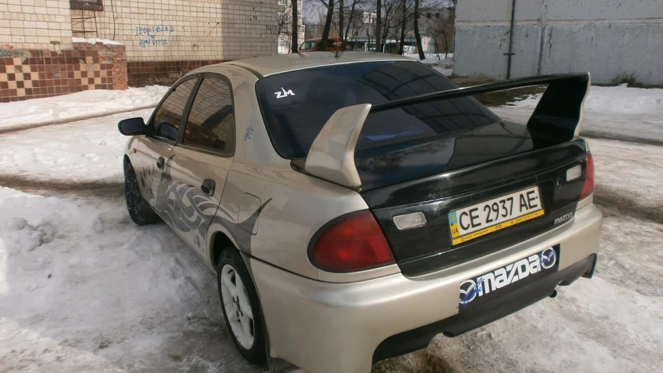 Mazda 323 сірий металік 1,5i 2