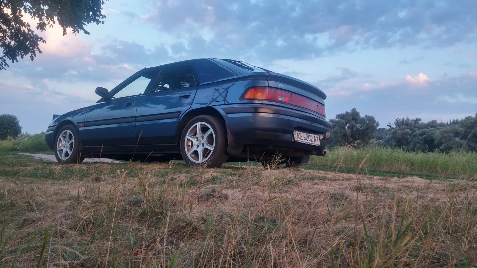 Mazda 323 синяя лялька 5