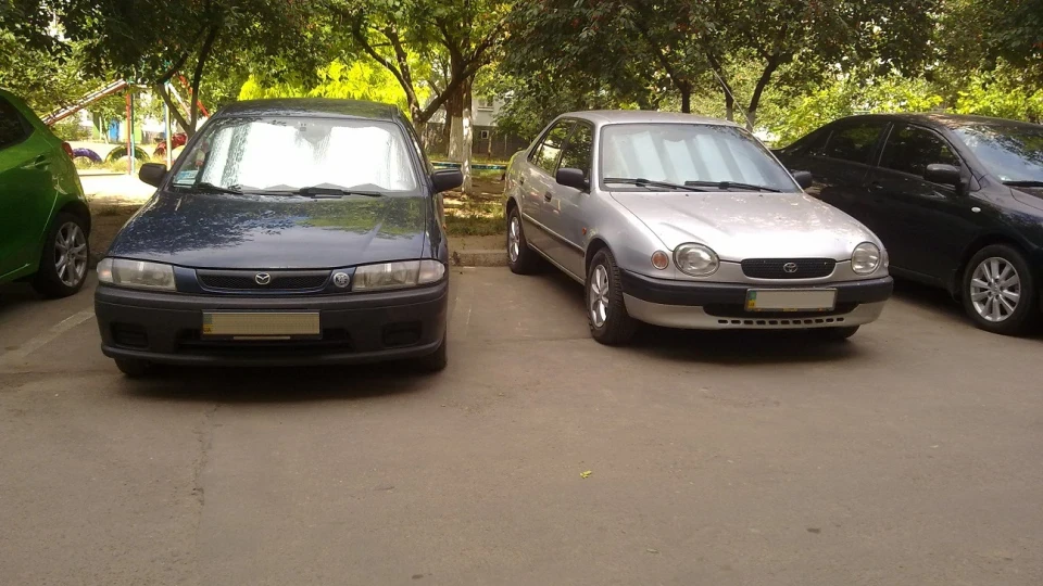 Mazda 323 Синій Sеданчег ツ 5