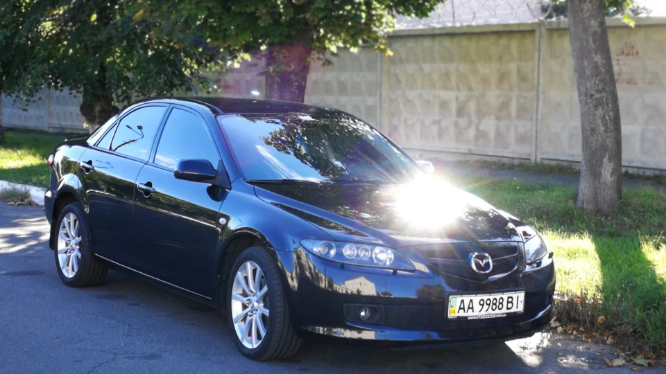 Mazda 6 чорна птиця 2