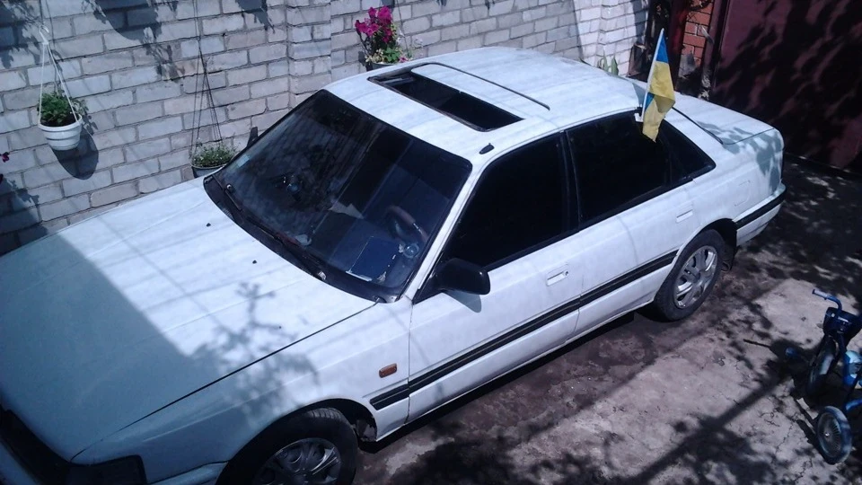 Mazda 626 Бельмо№1 2