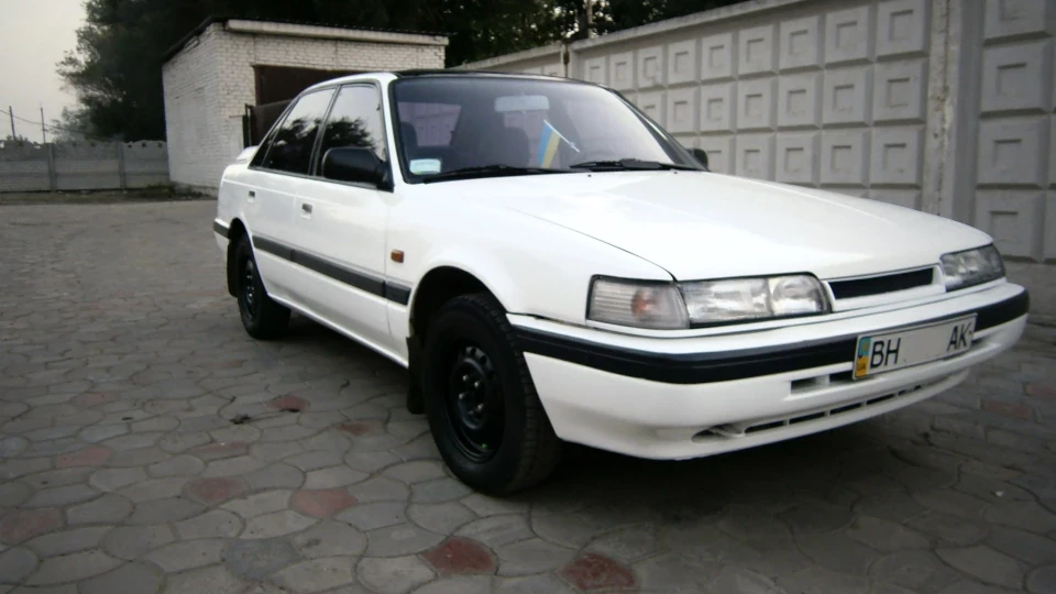 Мазда 626 біла стріла 4