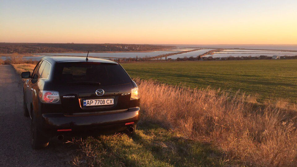 Mazda CX-7 клеє телиць ) 2