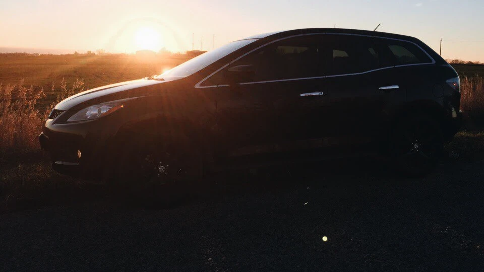 Mazda CX-7 клеє телиць ) 3