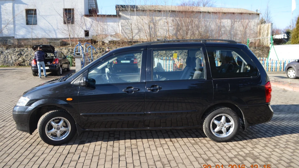 Mazda MPV чорна пташка zoom-zoom