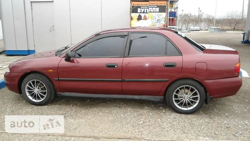 Mitsubishi Carisma «червоний металік 1.8gdi 2