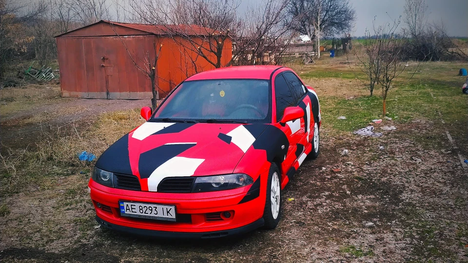 Mitsubishi Carisma Плямисте маля 3
