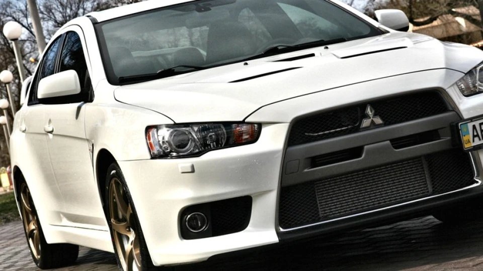 Mitsubishi Lancer Evolution White Power 5