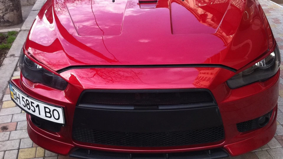 Mitsubishi Lancer ) 5