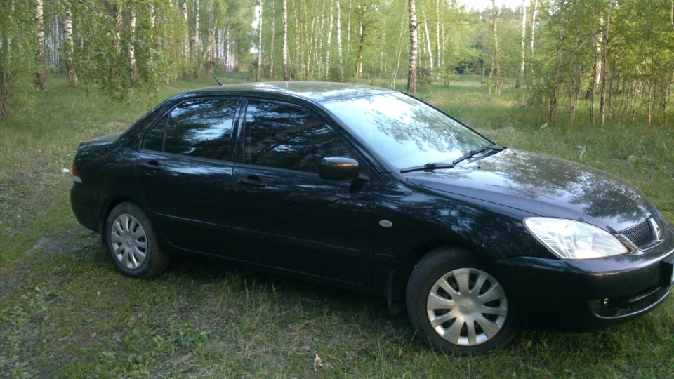Mitsubishi Lancer 1.6 автомат 5