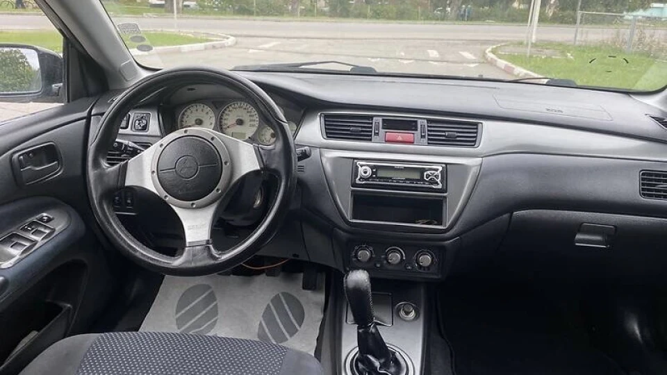 Mitsubishi Lancer 1.6 європейка 3