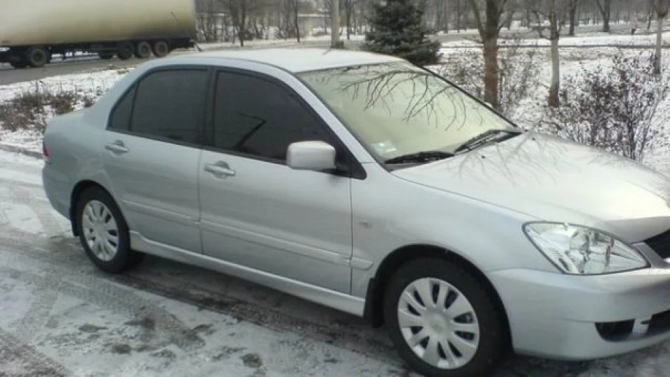 Mitsubishi Lancer 1,6 МТ, срібло S88 2