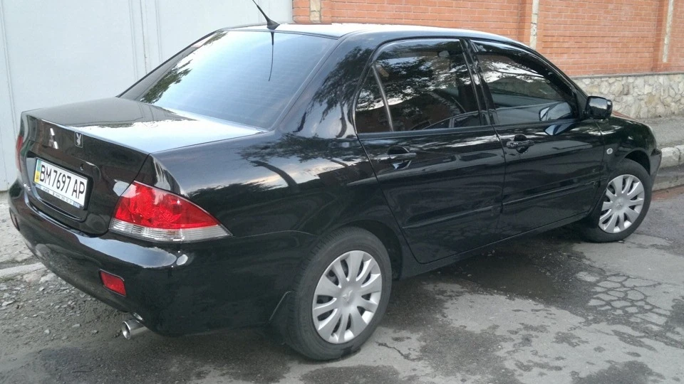 Mitsubishi Lancer 1,6 МТ 3