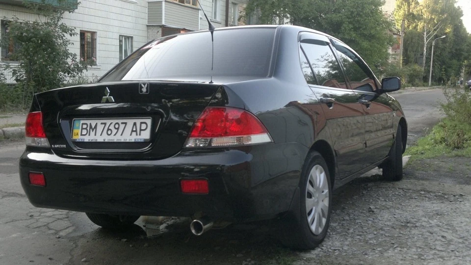 Mitsubishi Lancer 1,6 МТ 5