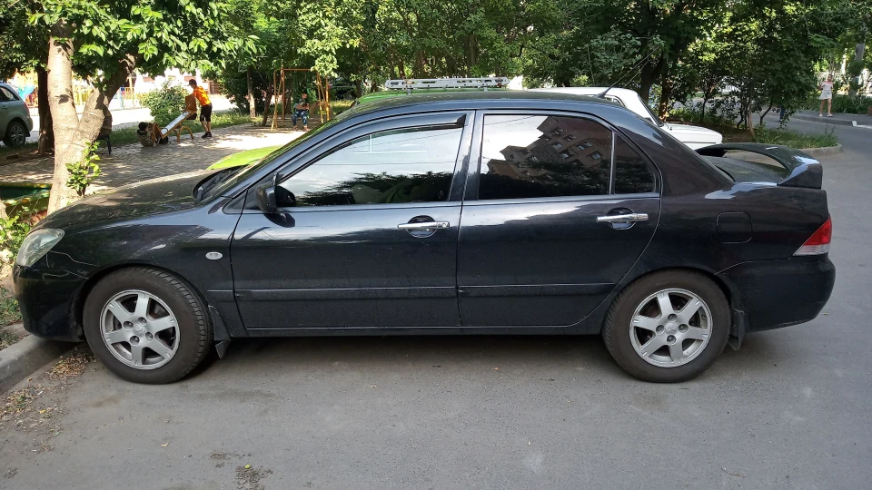 Mitsubishi Lancer Беззубик