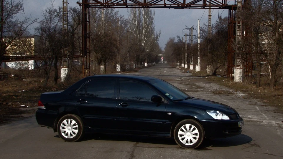 Mitsubishi Lancer чорник 2
