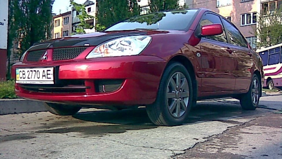 Mitsubishi Lancer змінив 12 на 9)))