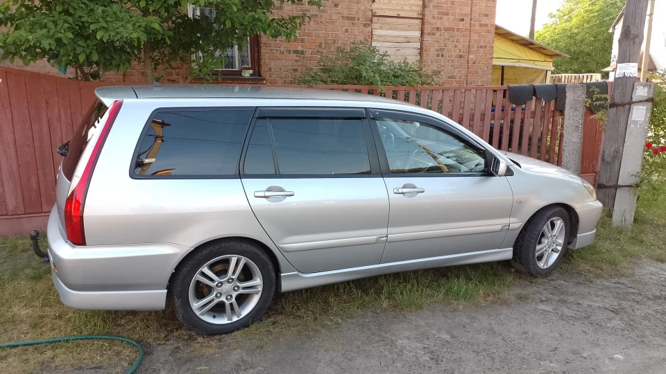 Mitsubishi Lancer Сарай на спорті 1.6 2
