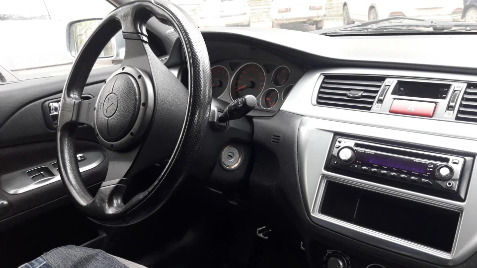 Mitsubishi Lancer Сарай на спорті 1.6 4