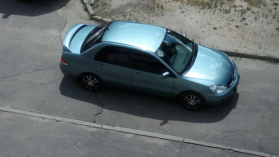 Mitsubishi Lancer Сіро-зелений
