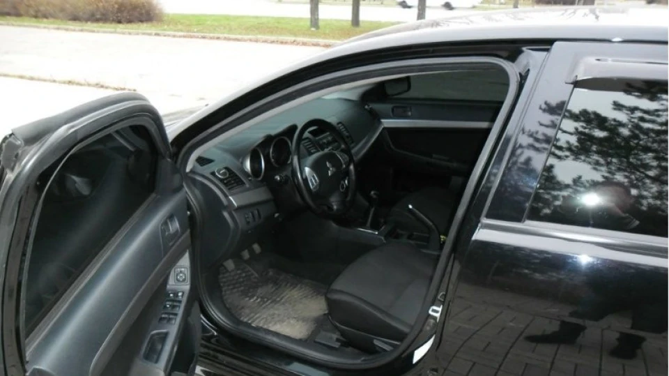 Mitsubishi Lancer Су-27