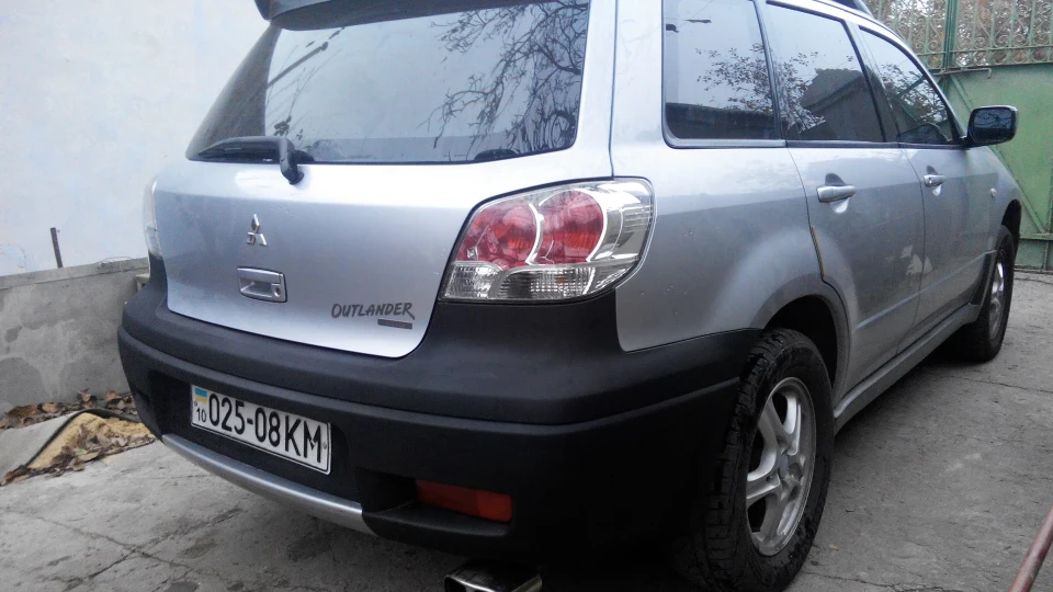 Mitsubishi Outlander 2.4 автомат газ-бензин