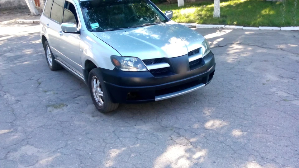 Mitsubishi Outlander 2.4 автомат газ-бензин 2