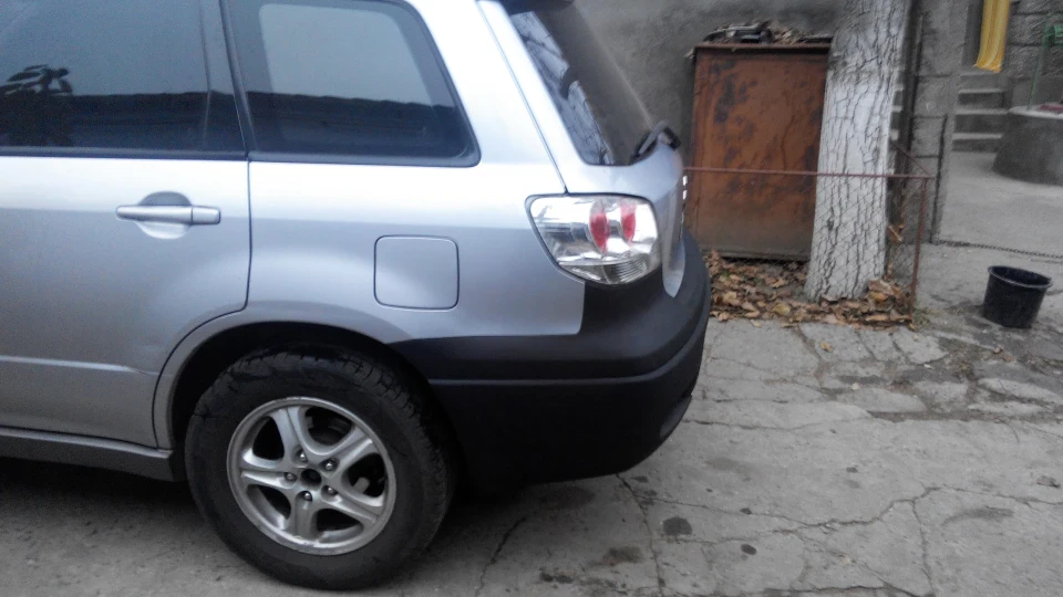 Mitsubishi Outlander 2.4 автомат газ-бензин 4