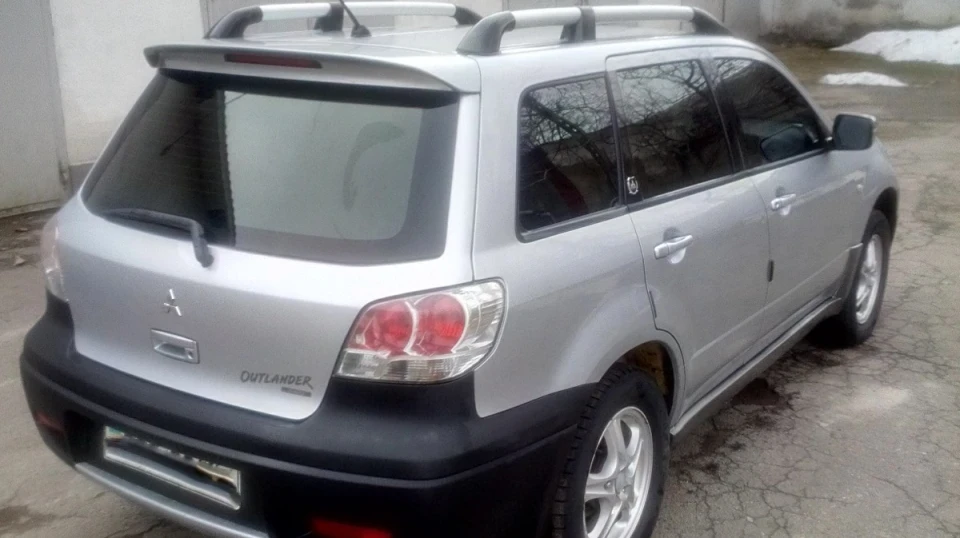 Mitsubishi Outlander 2.4 автомат газ-бензин 5