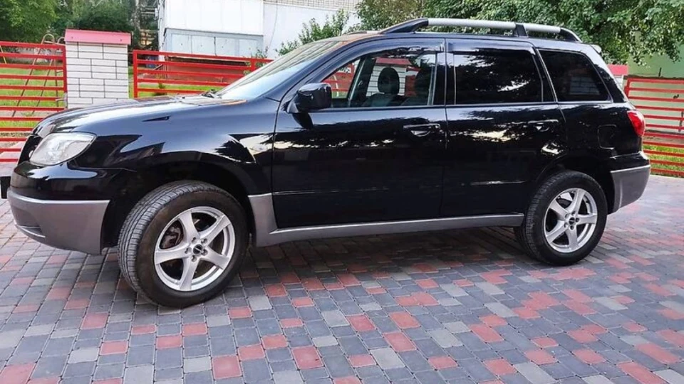 Mitsubishi Outlander Чорна черепаха