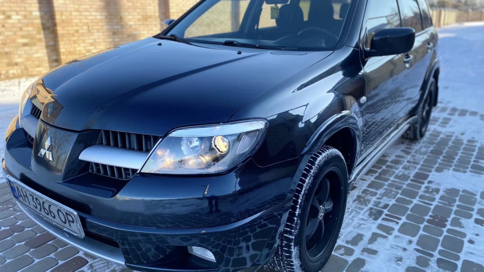 Mitsubishi Outlander Всюдихід 4